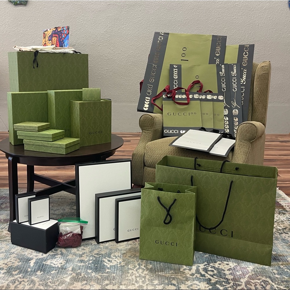Gucci boxes, bags and dust bags.